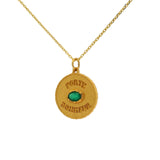 Gold necklace with lucky charm medal and stone
