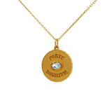 Gold necklace with lucky charm medal and stone