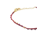 Bracelet doré cordon bordeaux grenat et perles dorées