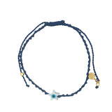 Bracelet doré cordon tressé bleu marine étoile avec oeil nacre
