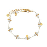 Bracelet doré cordon blanc perles de culture et pampilles rondes