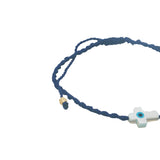 Bracelet doré cordon tressé bleu marine croix avec oeil nacre