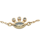 Bracelet doré oeil et couronne en zircons