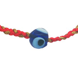 Bracelet sur cordon rouge avec oeil bleu en verre soufflé