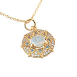 Gold necklace with star medal, stone and zircons