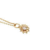 Collier doré marguerite avec un zircon 42 cm