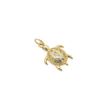 Charms doré tortue en zircons blancs