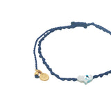 Bracelet doré cordon tressé bleu marine main de Fatma avec oeil nacre