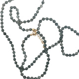 Collier doré perles grises et noeuds gris 75 cm