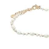 Bracelet doré petites perles de culture avec noeuds beige