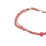 Bracelet doré cordon rouge et doré perle rouge