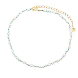 Chaine de cheville dorée petites perles de culture et fil turquoise