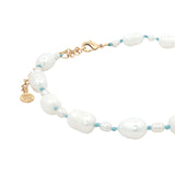 Chaine de cheville dorée petites et grandes perles de culture fil turquoise