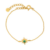 Bracelet doré rose des vents et onyx verte