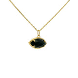Gold necklace with eye and stone pendant