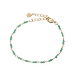 Bracelet doré avec duo onyx verte