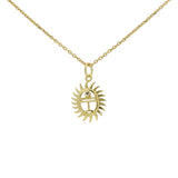 Collier doré scarabée avec un zircon blanc