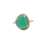 Golden ring with faceted stone and zircons