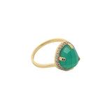 Golden ring with faceted stone and zircons