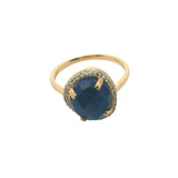 Golden ring with faceted stone and zircons