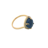Golden ring with faceted stone and zircons
