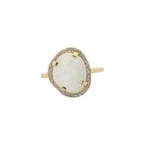 Golden ring with faceted stone and zircons