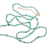 Collier doré perles vert d'eau avec noeuds verts 75 cm