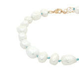 Chaine de cheville dorée perles de culture de différentes tailles et fil turquoise