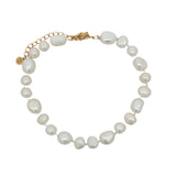 Chaine de cheville dorée perles de culture de différentes tailles et fil blanc