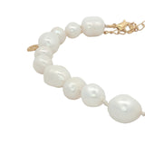 Chaine de cheville dorée perles de culture de différentes tailles et fil blanc