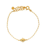 Bracelet doré oeil rose des vents et zircon noir
