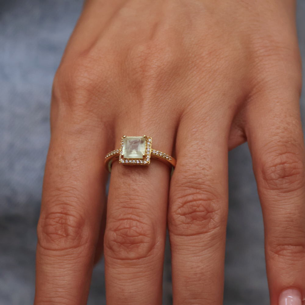 Gold square solitaire ring with zircons