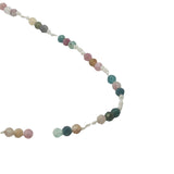 Collier doré avec tourmaline et noeuds blancs 42 cm