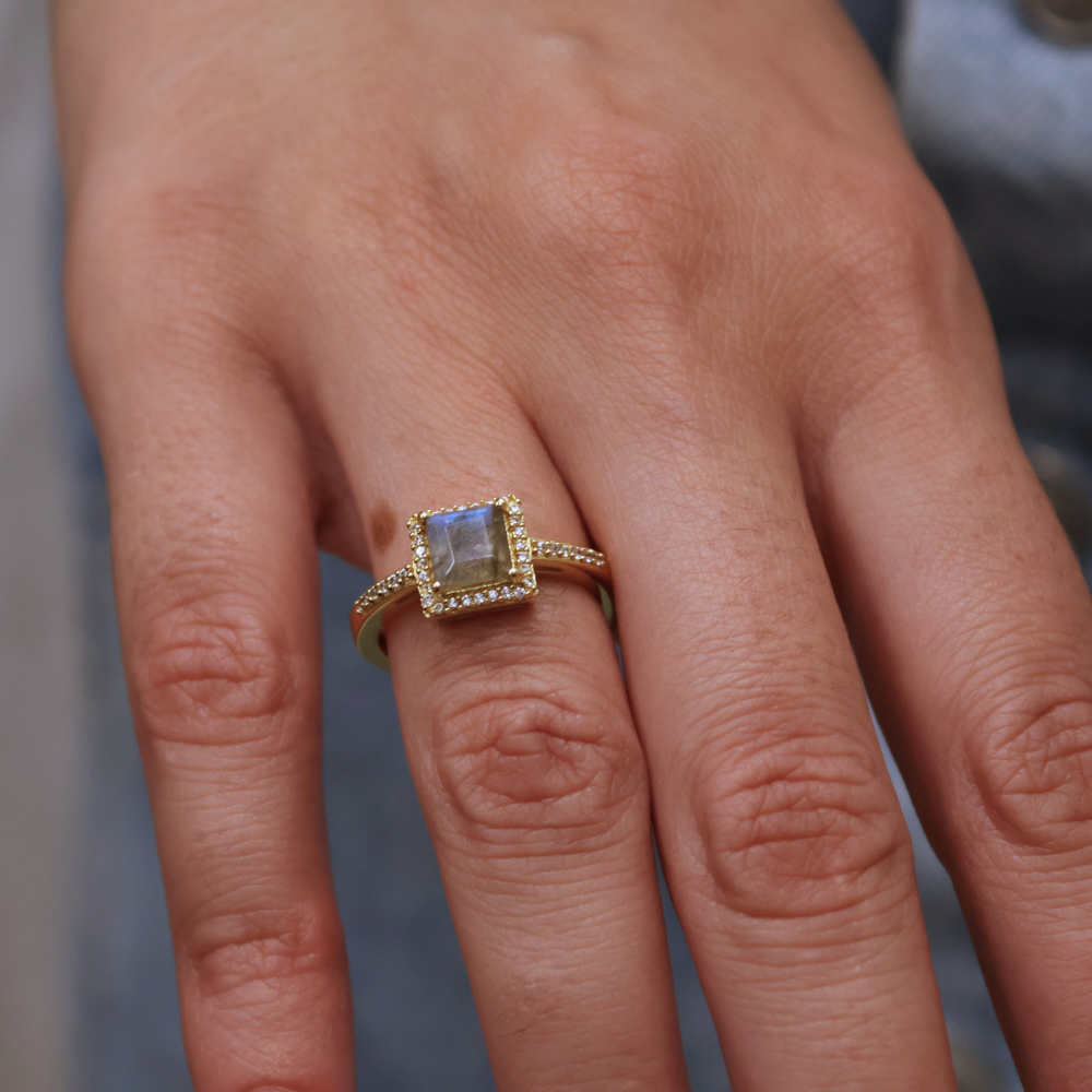 Gold square solitaire ring with zircons