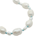 Collier doré alternance petites et grandes perles de culture avec noeuds turquoise 38 cm