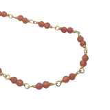 Collier doré avec duo onyx rouge 75 cm