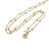 Collier doré zircon parme serti clos 38 cm
