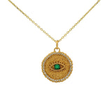 Gold necklace with eye stone and zircon medal