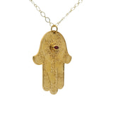 Collier doré main de fatma et pierre rubis 75cm