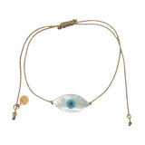 Bracelet doré fil fin oeil nacre ovale
