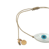 Bracelet doré fil fin oeil nacre ovale