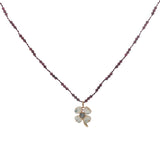 Collier doré grenat avec trèfle en coquillage et zircon  60 cm