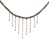 Gold necklace with stone and chains