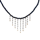 Gold necklace with stone and chains