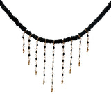 Gold necklace with stone and chains