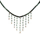 Gold necklace with stone and chains