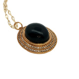 Collier doré médaillon onyx noire zircons 60 cm