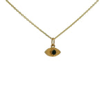 Gold necklace with hammered eye medal and stone