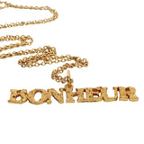 Collier doré pendentif martelé "bonheur" 42 cm