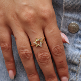 Gold ring with star of David and zircons